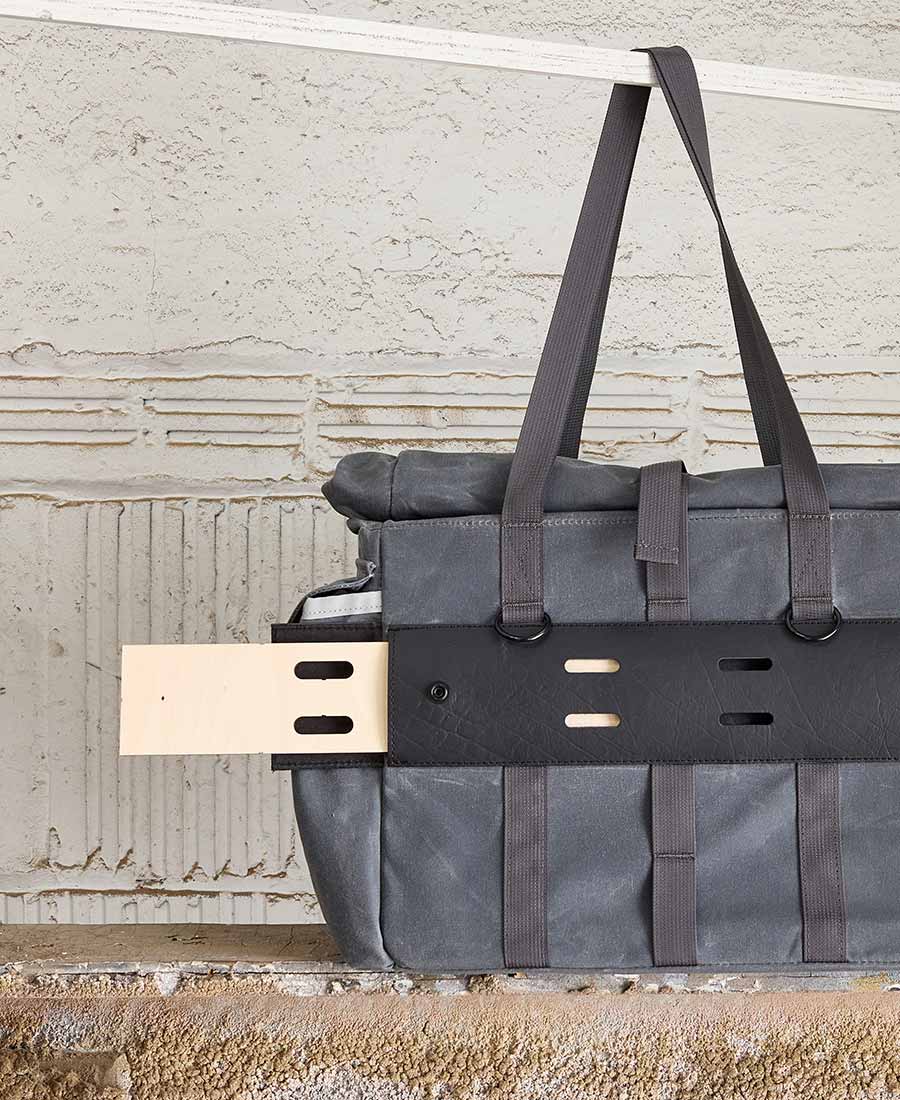 The back of the grey tote bag