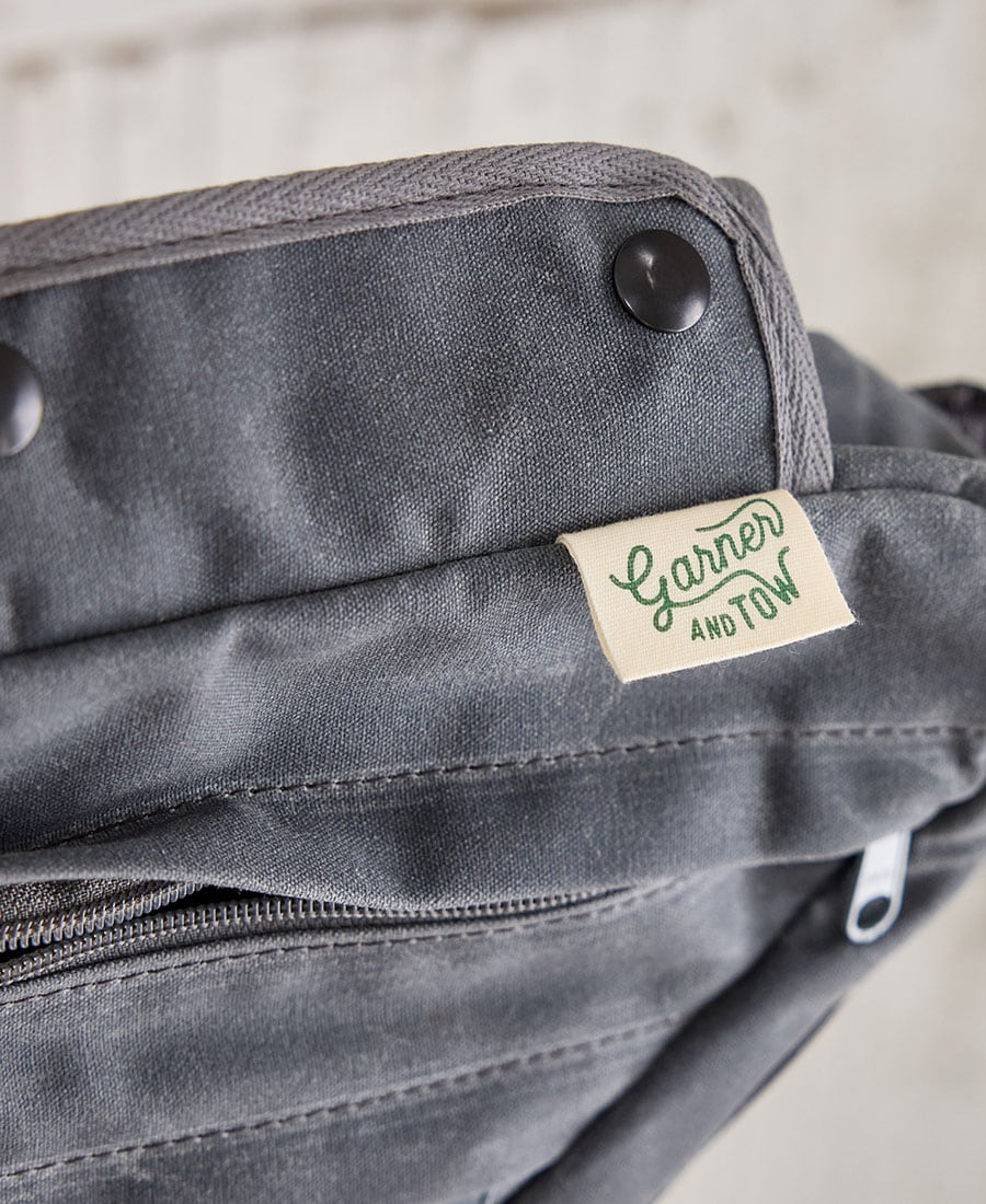a logo closeup of a gray framebag for garner and tow
