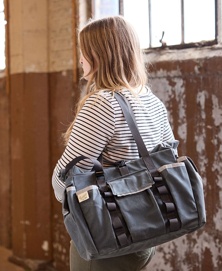 garner and tow tote back over the shoulder of a woman